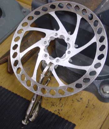 Disk to fixed hub conversion: sprocket clamped for drilling